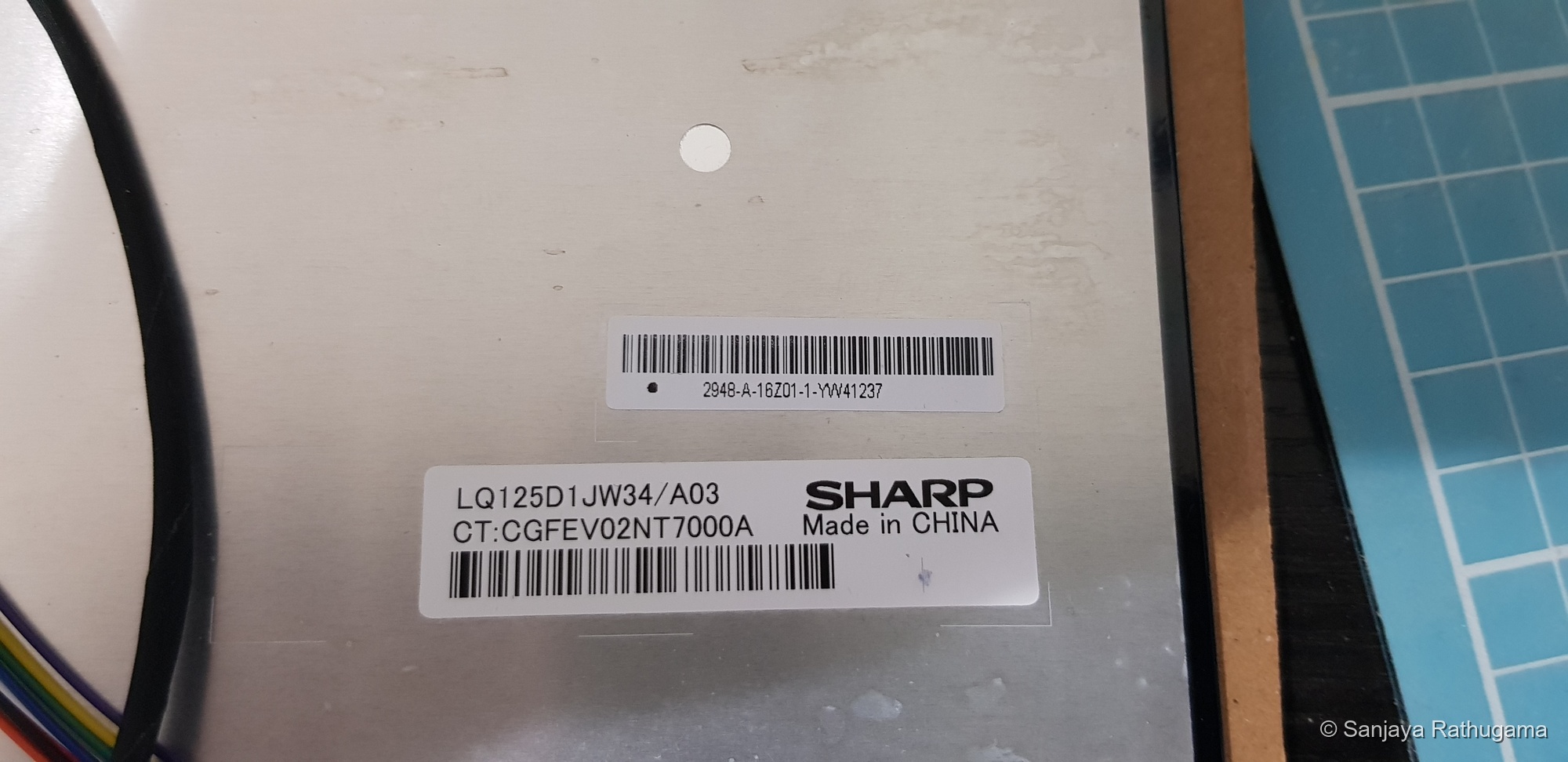 Model label on the rear of the Sharp LCD