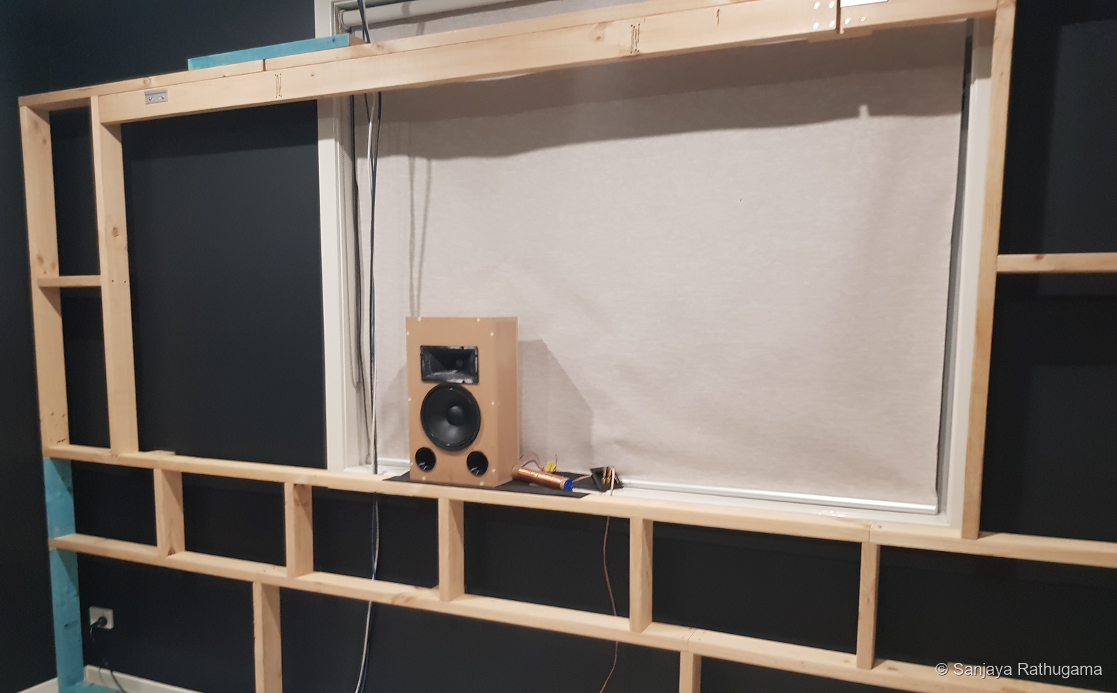 The smaller horn-loaded speaker in the developing front-wall framework